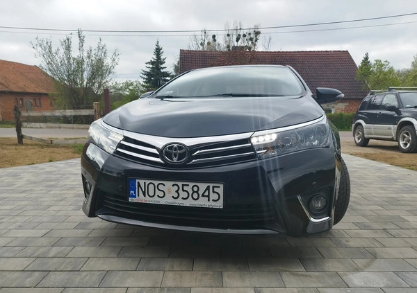 Toyota Corolla cena 46900 przebieg: 190000, rok produkcji 2014 z Morąg małe 121